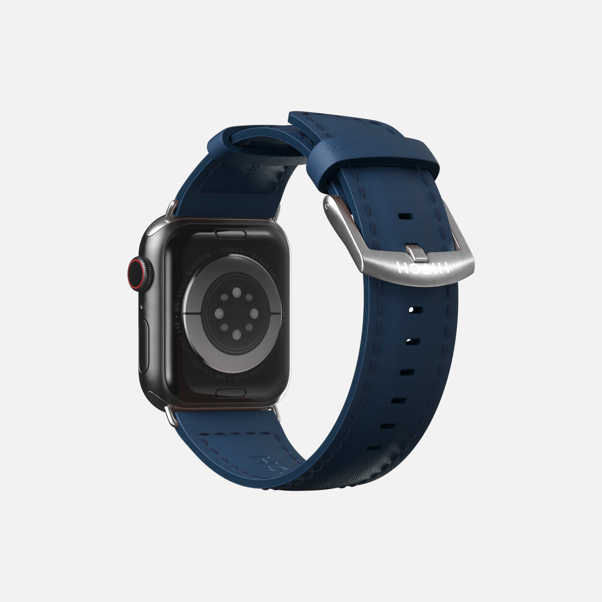 Rear view of an Apple smartwatch with a blue leather strap and silver buckle isolated on a white background.