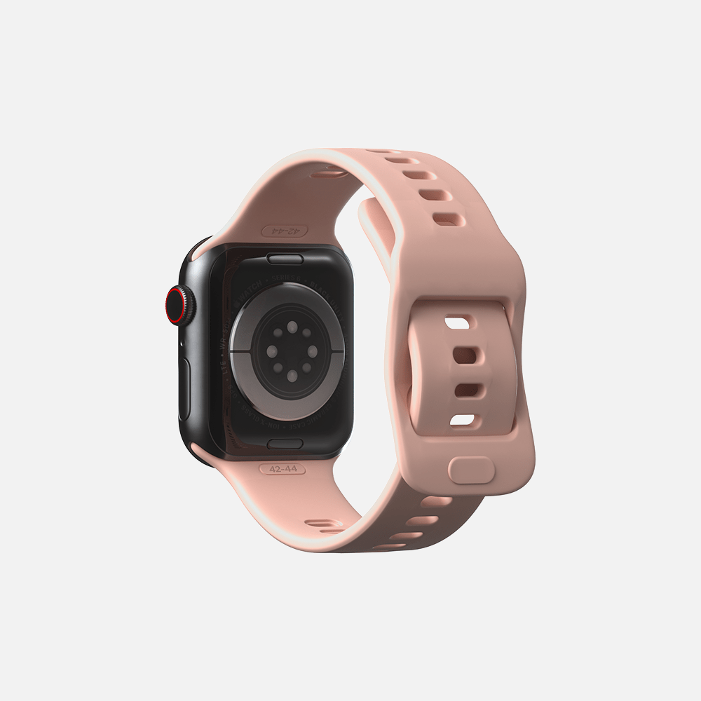 Back view of smartwatch with sensors and pink strap